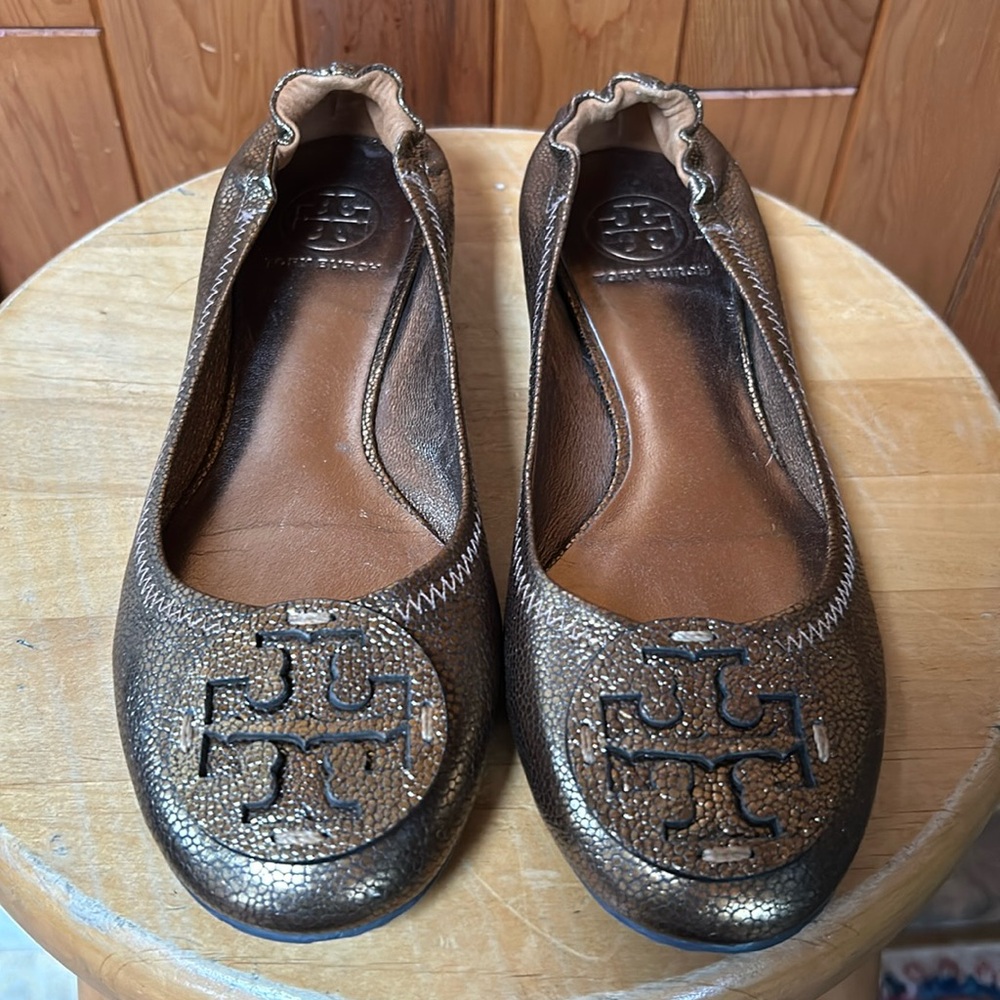 Gold Tory Burch flats in awesome condition